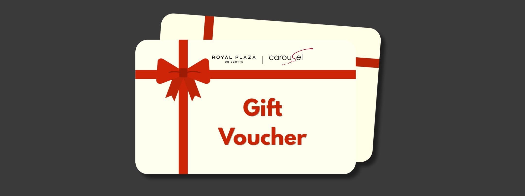Cream-colored gift vouchers adorned with a red ribbon and the prominent text "Gift Voucher".